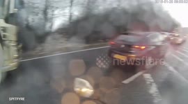 Biker moves blocking car