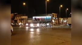 Public-spirited dad captured on camera singlehandedly directing traffic at one of Europe's busiest junctions