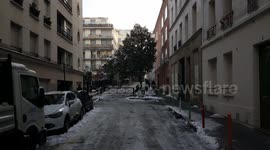 It is snowing in Paris! The city is blanketed!