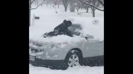 Asked son to brush off car and uses himself instead of a snow brush!