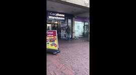 Fight between homeless man, trousers fall down bum on show