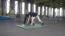 Narek Hakobyan! Clean style two-finger push ups with 15 kg. on my back