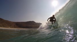 Surfing Blue Barrels