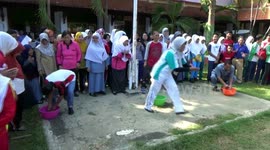 unique eel catching competitions are usually held to commemorate the independence day of Indonesia .... a slippery eel and disgust add to the excitement of participants at the time of arrest