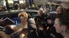Annette Bening and Gerard Butler mobbed at pre-Bafta dinner in London