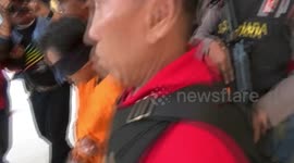 suspected terrorists are brought to densus 88 anti-terror in jakarta