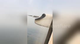 Newsflare Edit - Plane's engine catches fire and gets shut down mid-air (part 2)