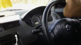 MAN DOES STUNT IN REVERSE CAR DRIVING