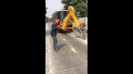 Lads fooling around with JCB drill