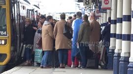 Animated argument as a rail passenger is told he cannot board a train