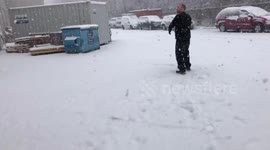 Snowing very heavily