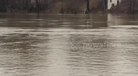 Flooding shuts down a main road through Dundee, Michigan
