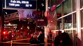 Exact moment when a UMB bank sign is brought down