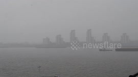 Heavy snowfall in East London during the #BeastfromtheEast storm looking across the River Thames