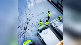 London police officers caught having snowball fight
