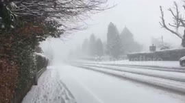Snowstorm on a road in the Southside of Glasgow
