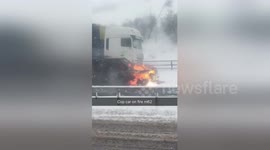 Highways England vehicle catches on fire during UK snowstorm