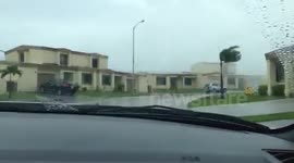 Wave crashing over house