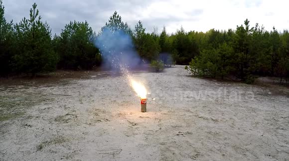See how a Coca-Cola bottle reacts with 2,000 lit sparklers inside
