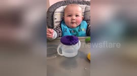 Newsflare Edit - Cute baby blowing raspberry with Mum.