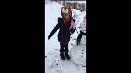 Grumpy snowman with the dog