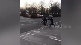 Lidl worker captured on camera chasing a suspected shoplifter before hitting him over the head with a PORK leg