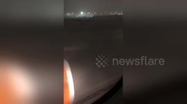 Newsflare Edit - Luton Airport flight from Geneva landing in heavy snow.