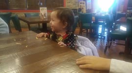 Kids sitting at the table plotting