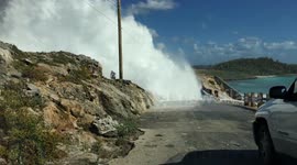 Man swept off bridge by giant waves in Bahamas