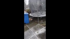 Winter Fun Turns Tumble: 7-Year-Old's Snowy Trampoline Slip!