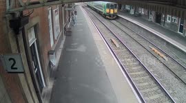 CCTV shows the moment an unattended buggy smashing into oncoming train