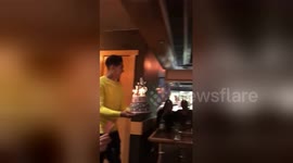 Another great assist: Firmino delivers birthday cake to fan