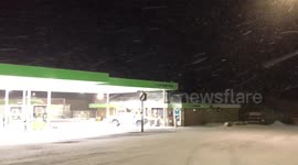 The sovereign garage petrol station junction covered in snow