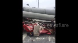 Tubular piles crush semitrailer's cab, killing driver
