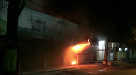 5 shops burned owner crying hysterically