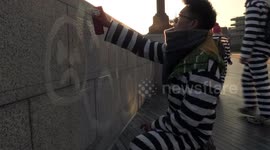 Activists arrested after painting ‘clean air’ slogans on London's City Hall