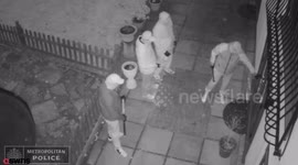 A gang of thugs armed with hammers and a crowbar smashed their way into a family home before threatening an 11 year old boy and spraying liquid in the face of a pensioner