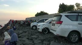 residents probolinggo have a tradition of sea water bath, this teraphy in believed can cure the disease