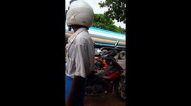 Two Buddhist monks fighting with umbrellas in Burma