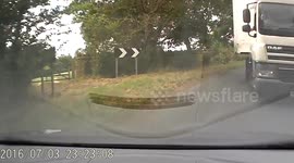 Car near collides with lorry on country road bend in Bedfordshire