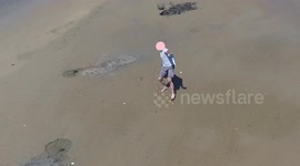 Clammer Attacks Drone with Rake in Mid-Air!