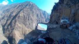 GoingEastwards - Riding on edge of road/cliff