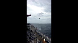 Carnival Triumph supply chopper and tugboat