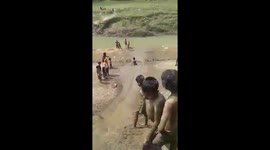 Play a natural slide of mud above the river