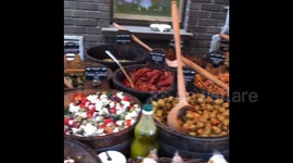 on the market, people buying food