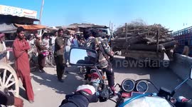 Armed Escort in Pakistan Panics when stuck in Traffic