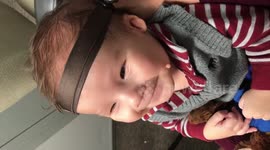 Baby giggles as he hears his mother's voice for the first time