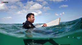 Artist who couldn't afford a studio now travels the world selling his coastal pictures which he creates - in the SEA