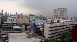 Workers caught on high-rise roof during lightning storm