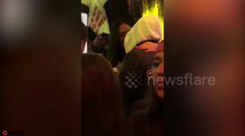 Khloe Kardashian's boyfriend getting up close and personal with a mystery brunette on a night out